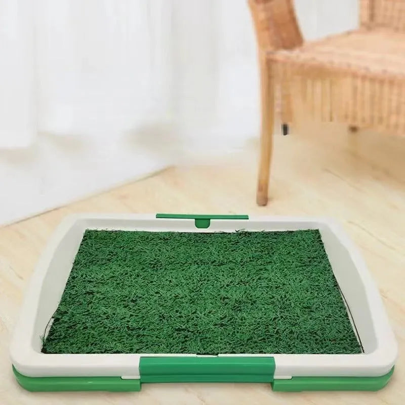 Green three-layer indoor dog toilet tray for puppy potty training with artificial grass