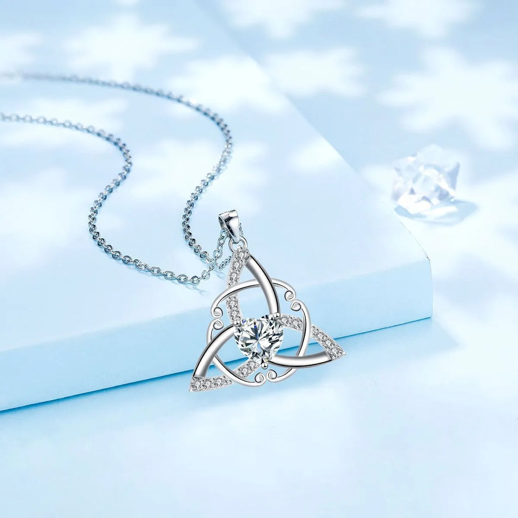 Copper Celtic knot necklace for women with geometric pendant in electroplated blue colour.
