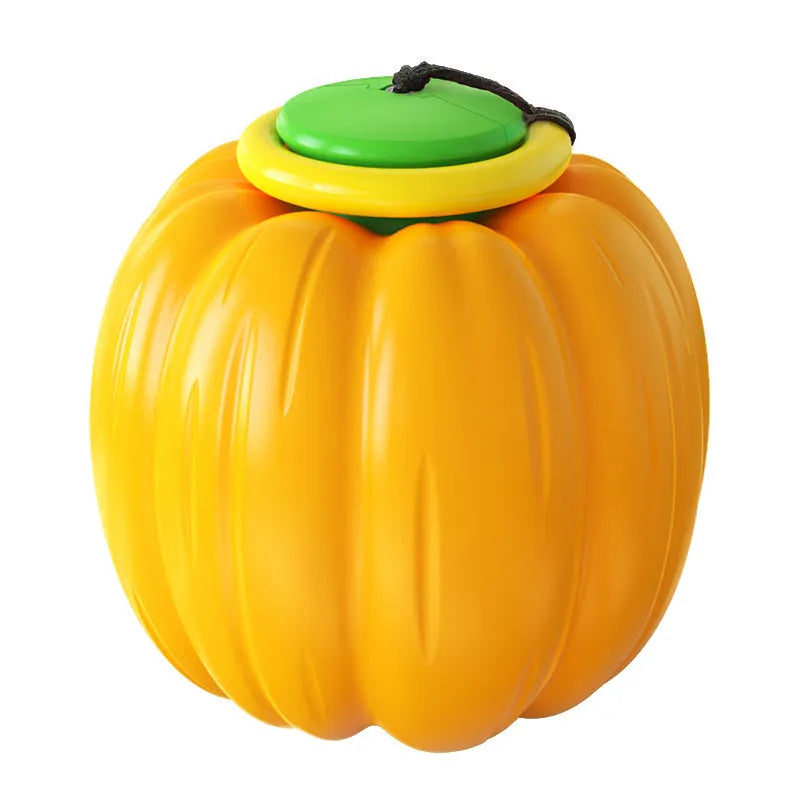 Orange plastic squeaky dog ball with Halloween pumpkin design for small breed chewing and training