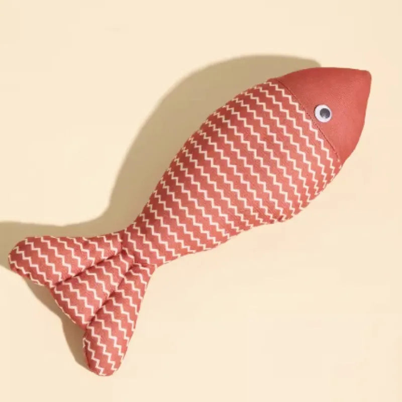 Soft red, blue, and yellow plush fish cat toys filled with catnip in large and medium sizes.