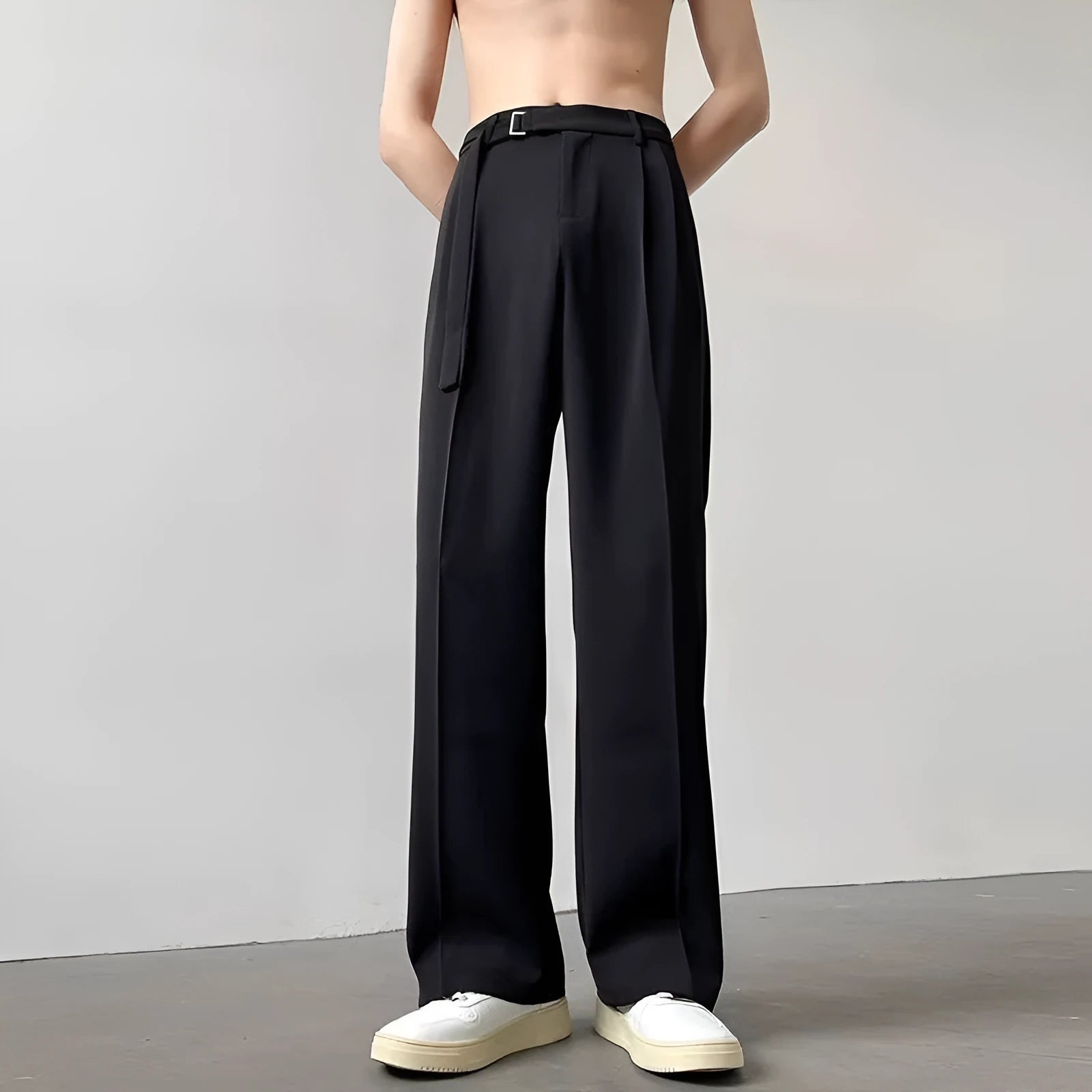 Thin straight black wide leg loose trousers laid flat, showing non-ironing casual style.