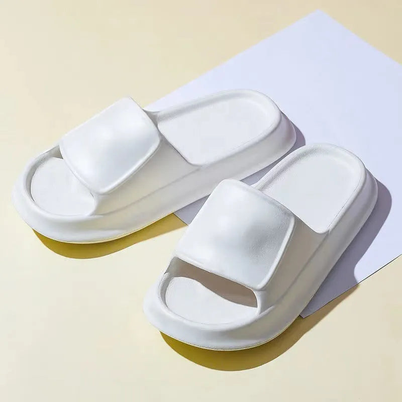 Thick sole EVA flip flop slippers in multiple colours on a white background.