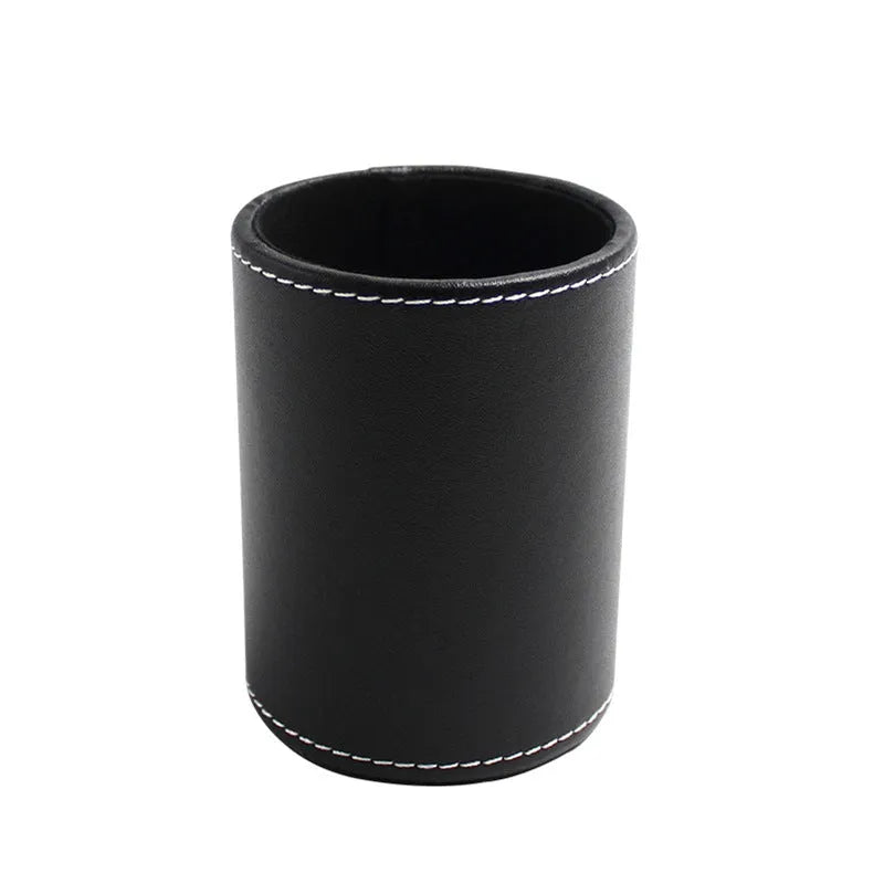 Round black leather pen container measuring 8.0cm diameter and 10.8cm height