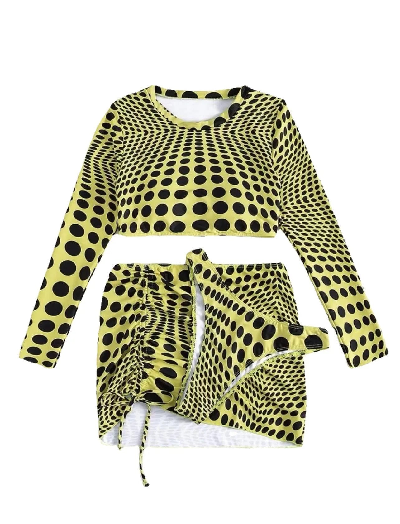 Women's green polka dot three-piece swimsuit set with bra top and skirt on hanger