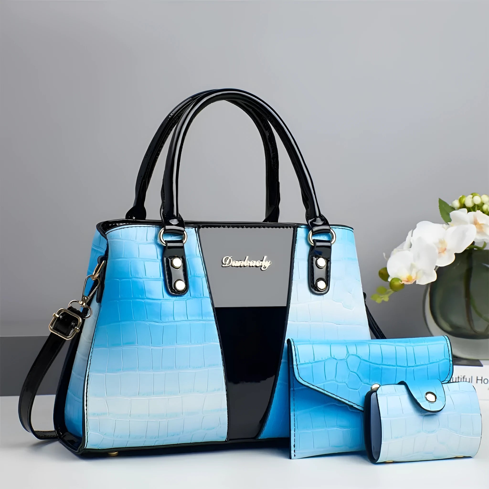 Women's crocodile stitch three-piece shoulder bag set in PU leather showing main bag, small bag, and card pouch