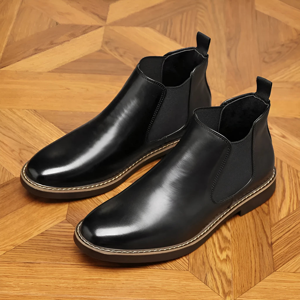 Men's black formal pointed-toe leather boots with a square heel on a white background