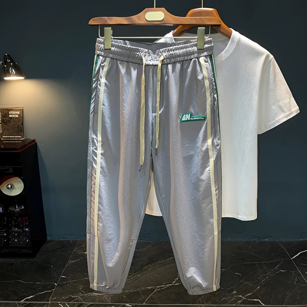 Men's solid colour cotton harem pants with elastic waistband in black or grey