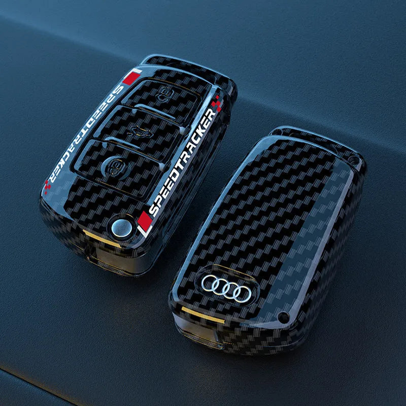 Carbon fibre style car key cover with mirrored finish in white and carbon colour options