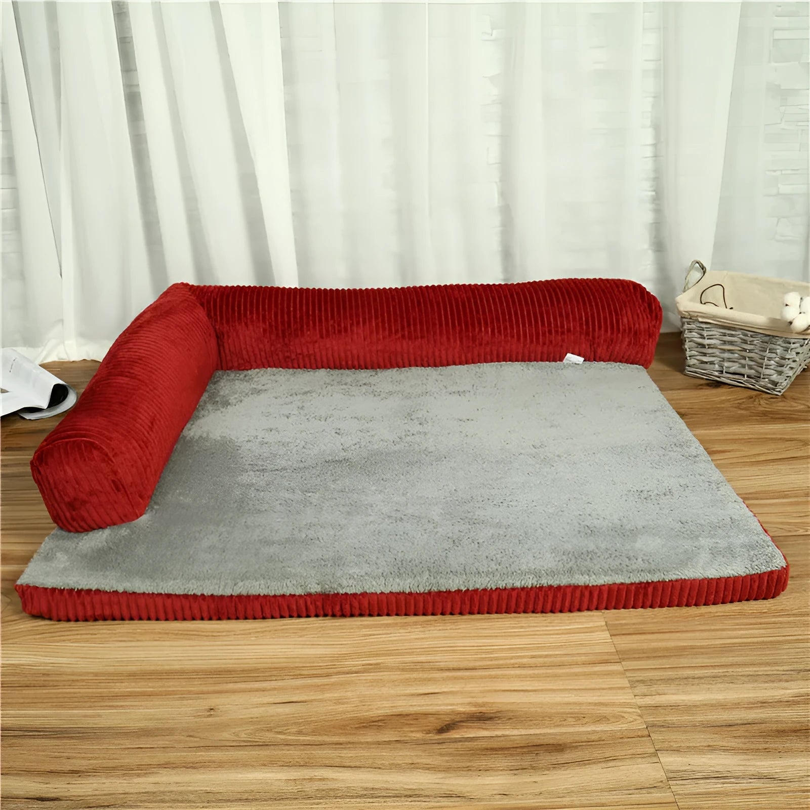 Corduroy fabric pet sofa dog bed in a grey colour, showing raised sides and plush high-density sponge padding.