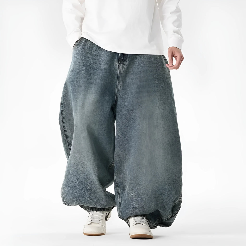 Men's plus size wide leg baggy jeans in black denim with straight leg openings