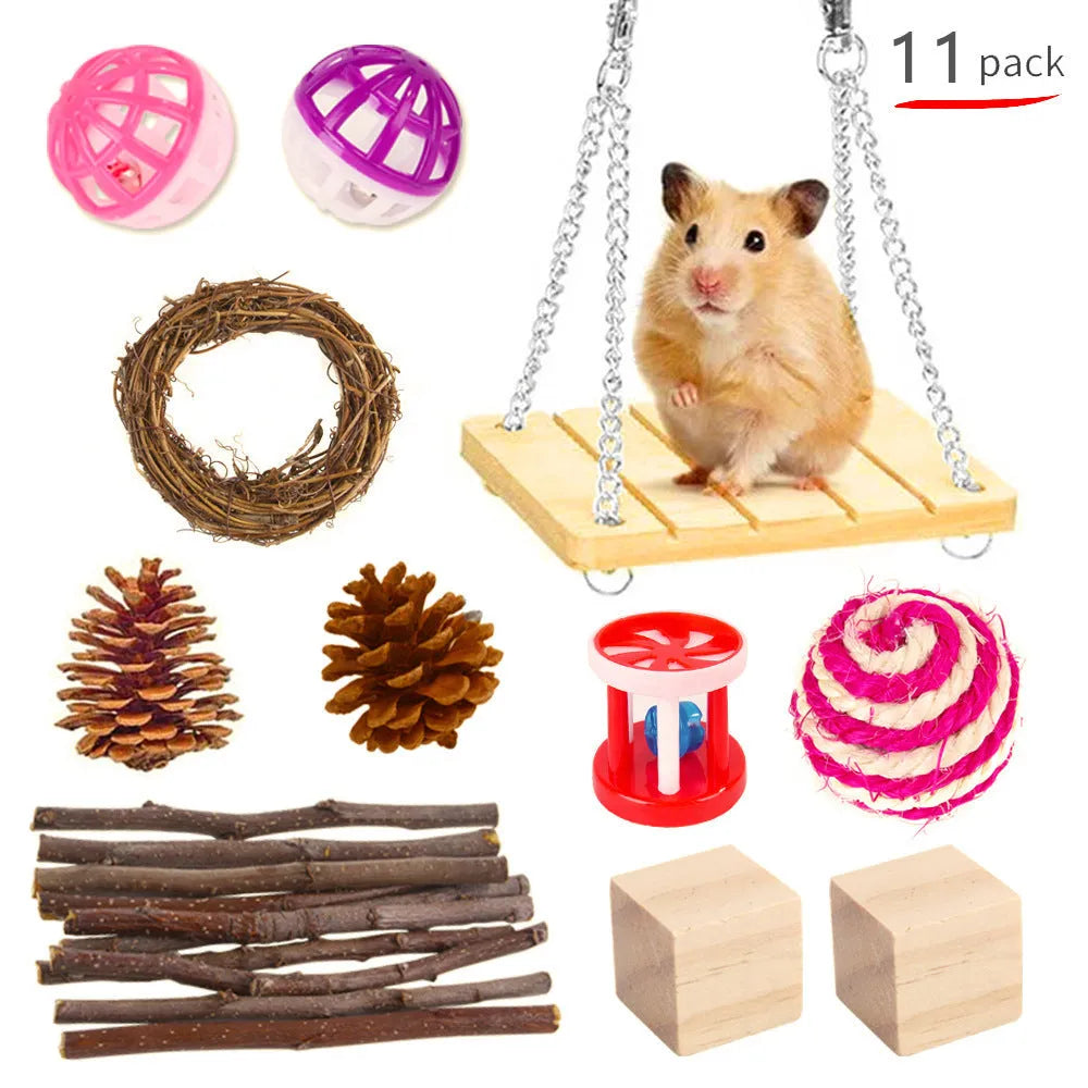 Assortment of wooden and natural fibre chewing toys for pet rabbits, guinea pigs, and parrots on a straw mat