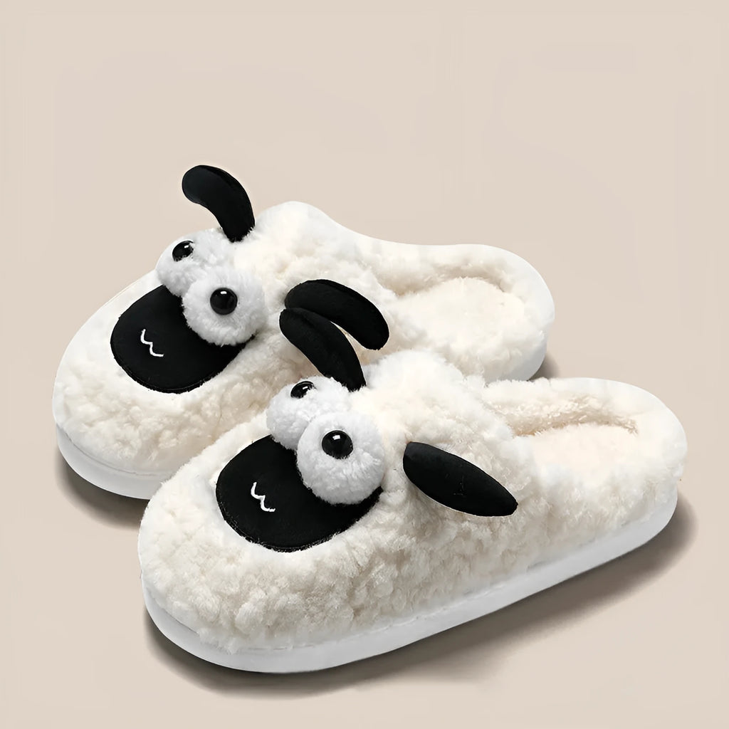 Slip-on thermal cotton slippers in brown colour with a suede upper and PVC sole.