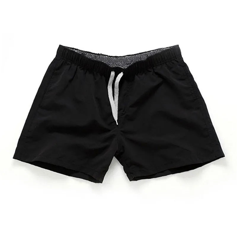 Men's straight leg beach shorts in multiple colours, made from polyester fabric, shown on size chart from S to 4XL.