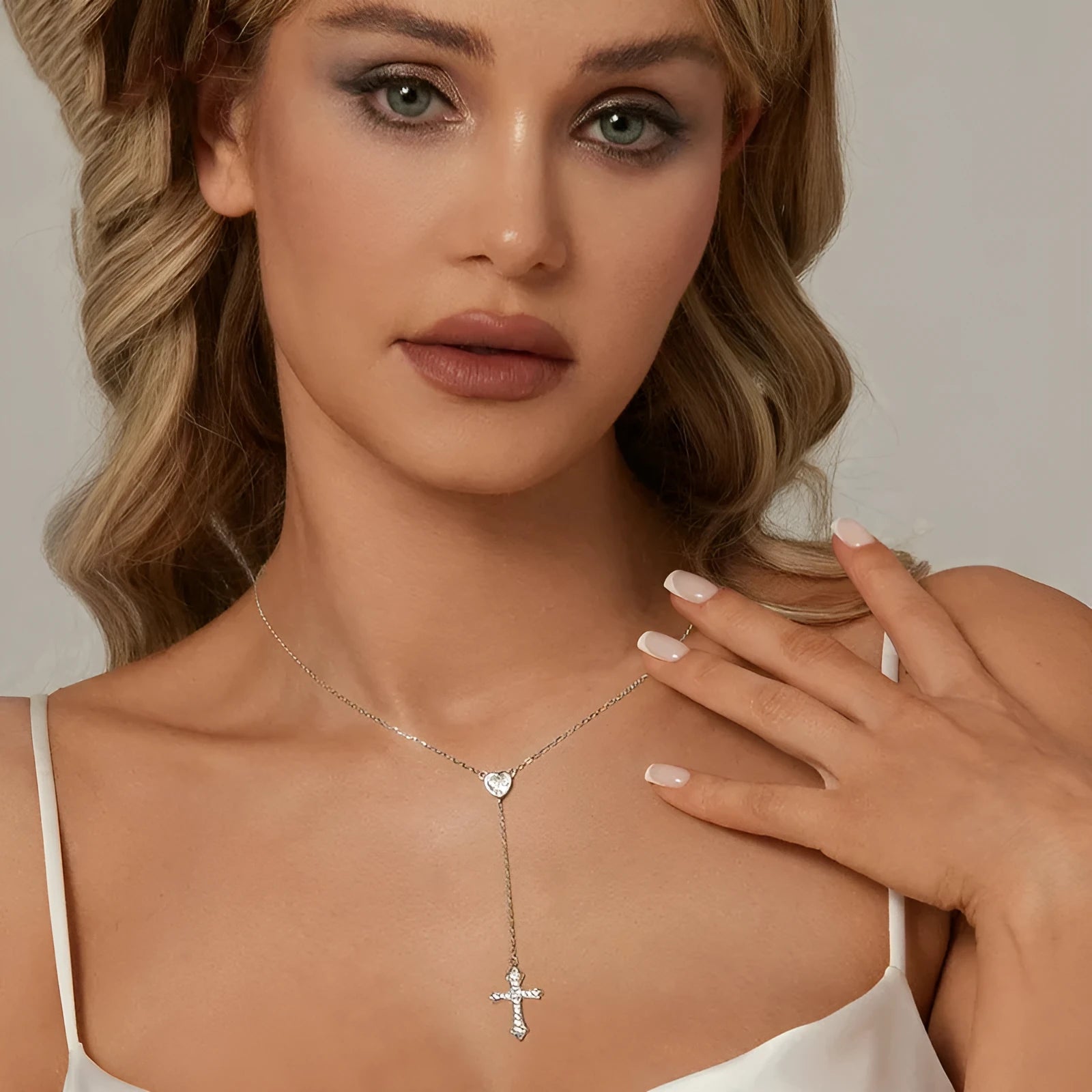 Women's silver love cross necklace on a V-neck O-ring chain, BSN384 colour.