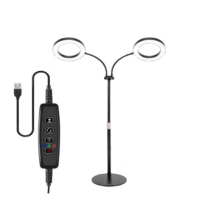 6-inch silver angel ring LED plant grow light on a retractable floor stand next to a houseplant.