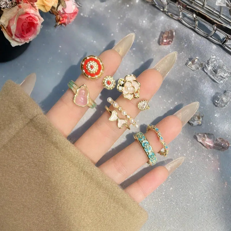 Vintage copper gourd ring with adjustable opening, flower and bow design, zircon inlay