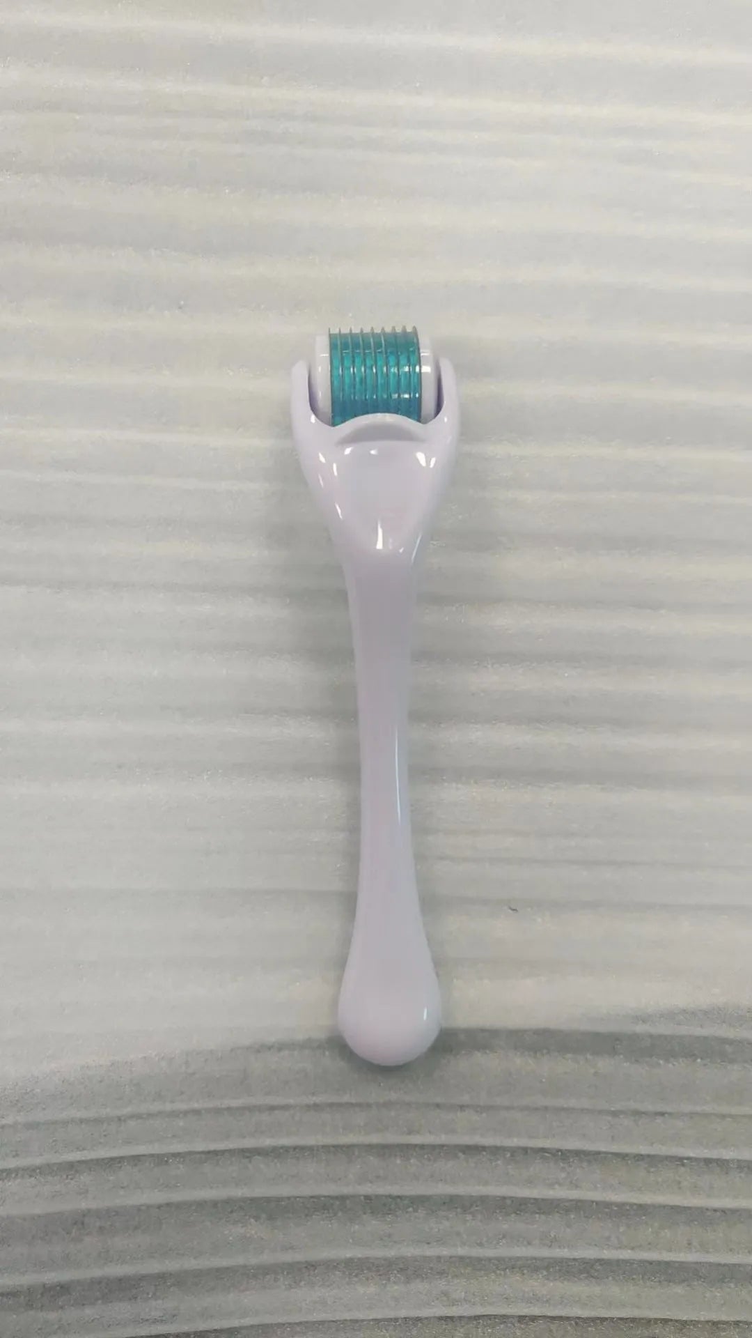 540 micro needle dermaroller roller with black handle and coloured wheel showing needle specification