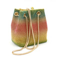 Soft rainbow-coloured rhinestone bucket bag with a silver chain shoulder strap on a white background.