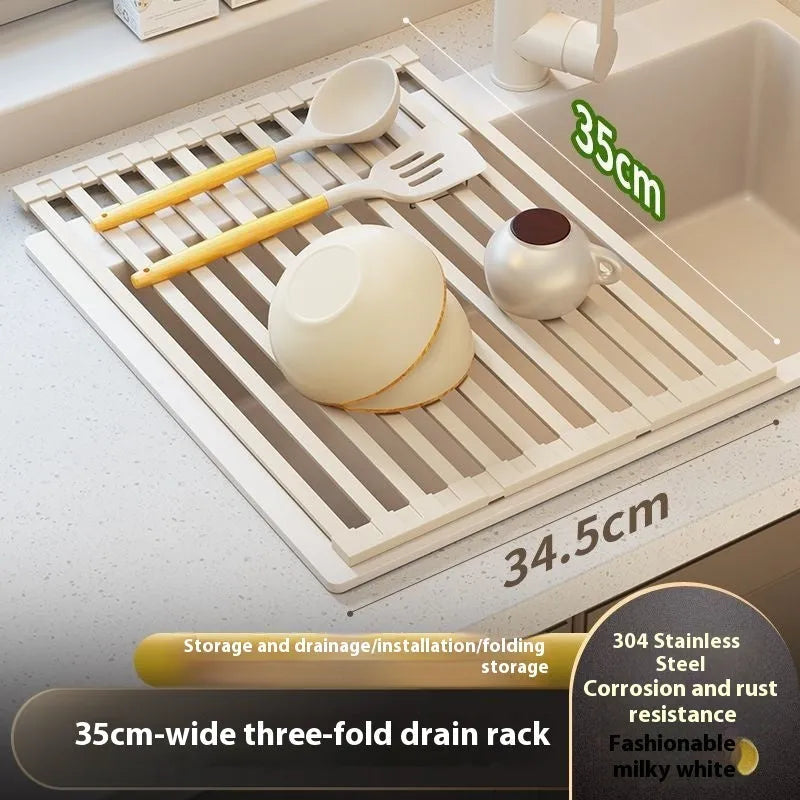 Foldable stainless steel kitchen draining rack in milky white finish showing tri-fold mechanism