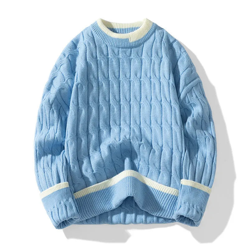 Man wearing a loose-fit long sleeve modal sweater in light blue, part of a two-piece set.