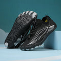 Children's elasticated water shoes in blue with a non-slip rubber sole and breathable mesh upper.