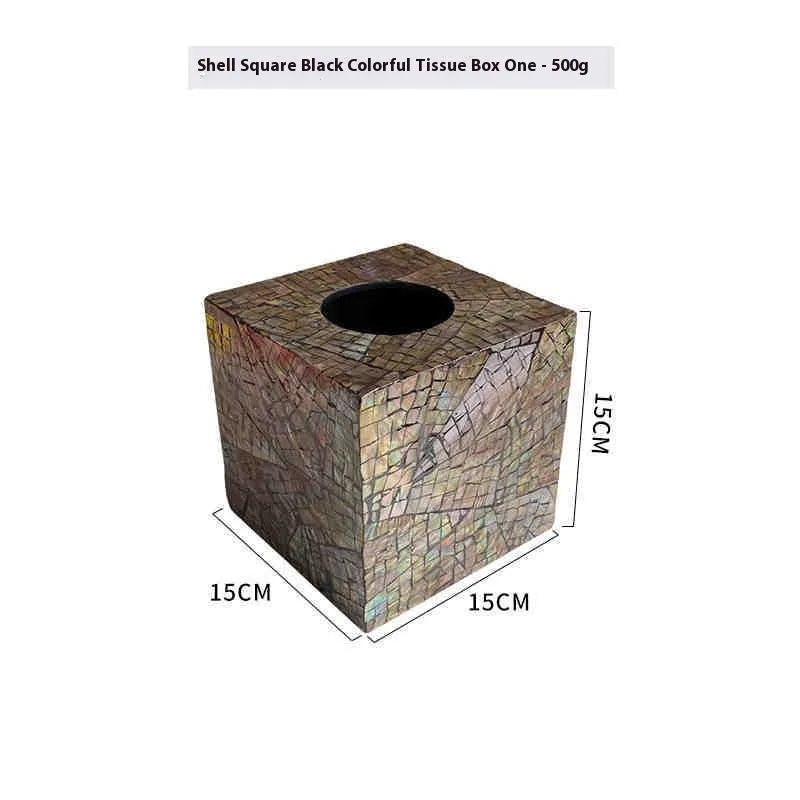 Natural shell rectangular and square storage box for tissue box organisation on a coffee table.