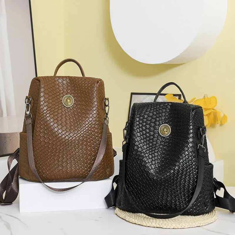 Women's black PU anti-theft backpack with waterproof function and organised internal compartments