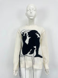 Women's grey alpaca wool sweater with tassel design and abstract pattern