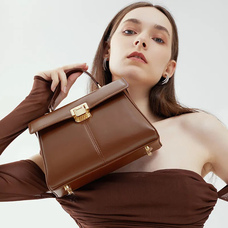 Women's black genuine leather shoulder handbag with vachette clasp in horizontal square shape