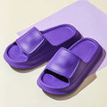 Thick sole EVA flip flop slippers in multiple colours on a white background.