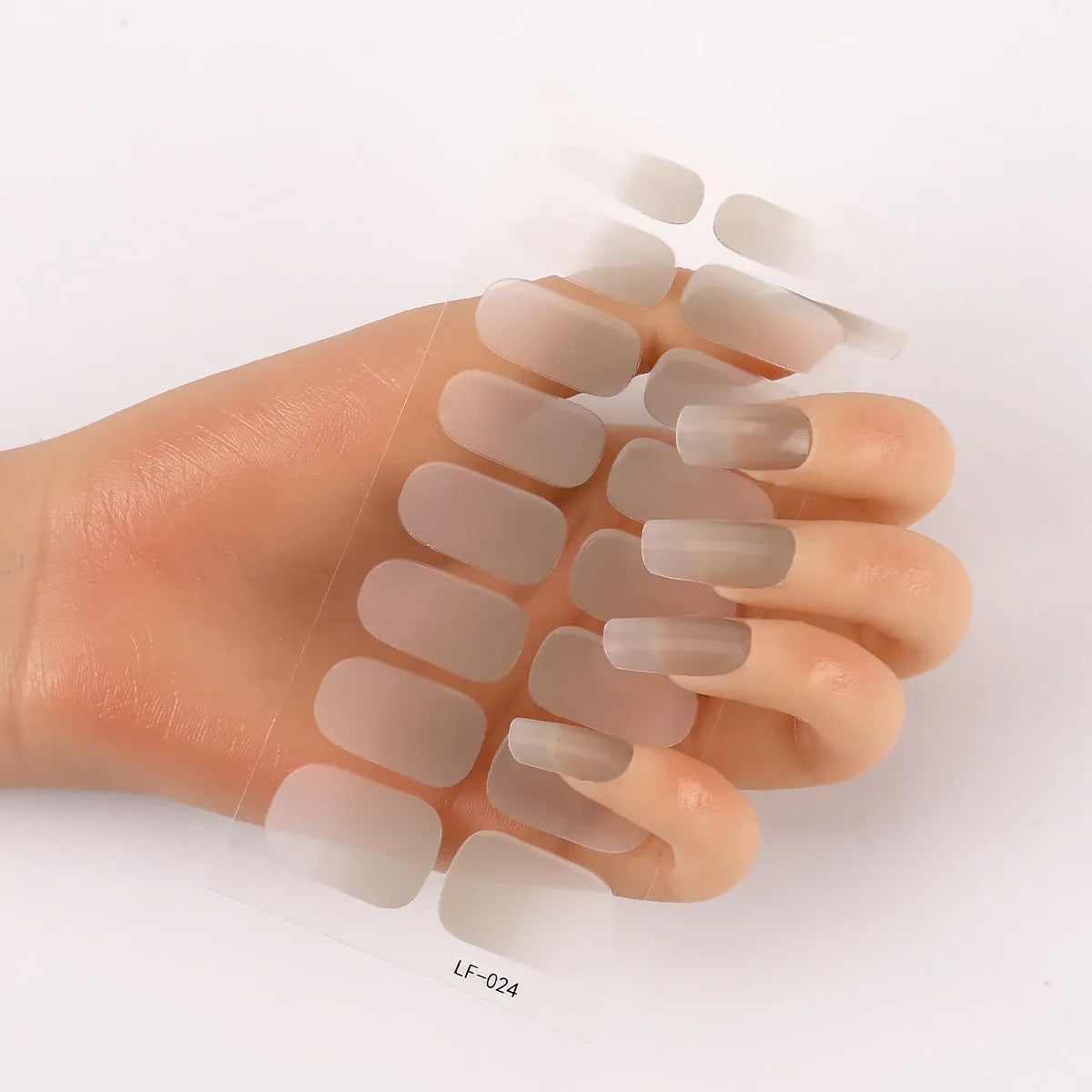 Sheet of 16 solid colour nail art sticker designs including cross, rose, and leopard print patterns.