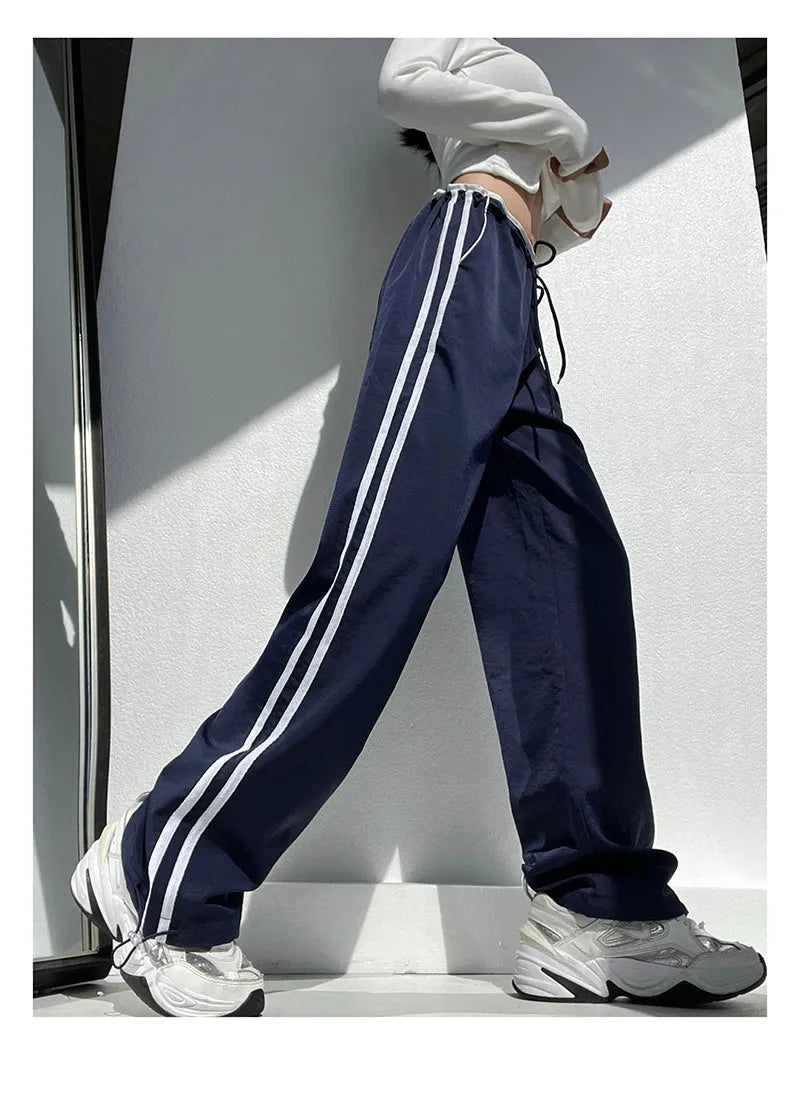 Women's slim-fit drape trousers in thin fabric with low waist and straight leg