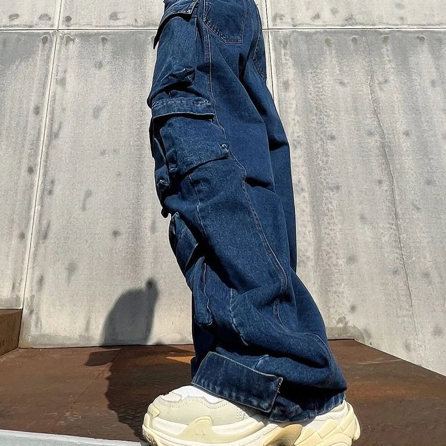 Dark blue distressed wide-leg women's jeans with high waist and multiple utility pockets