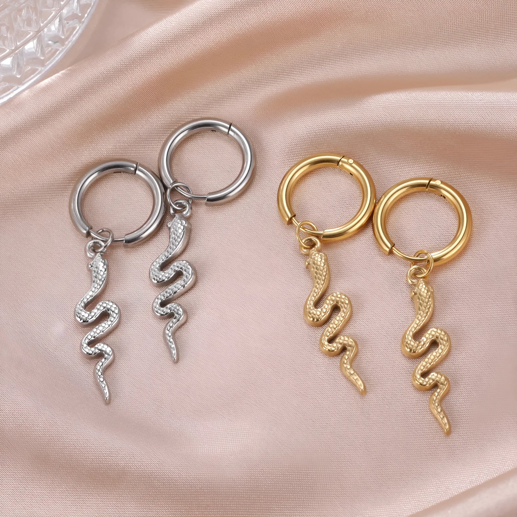 Stainless steel snake-shaped vintage clip earrings with electroplated gold finish and animal zodiac design