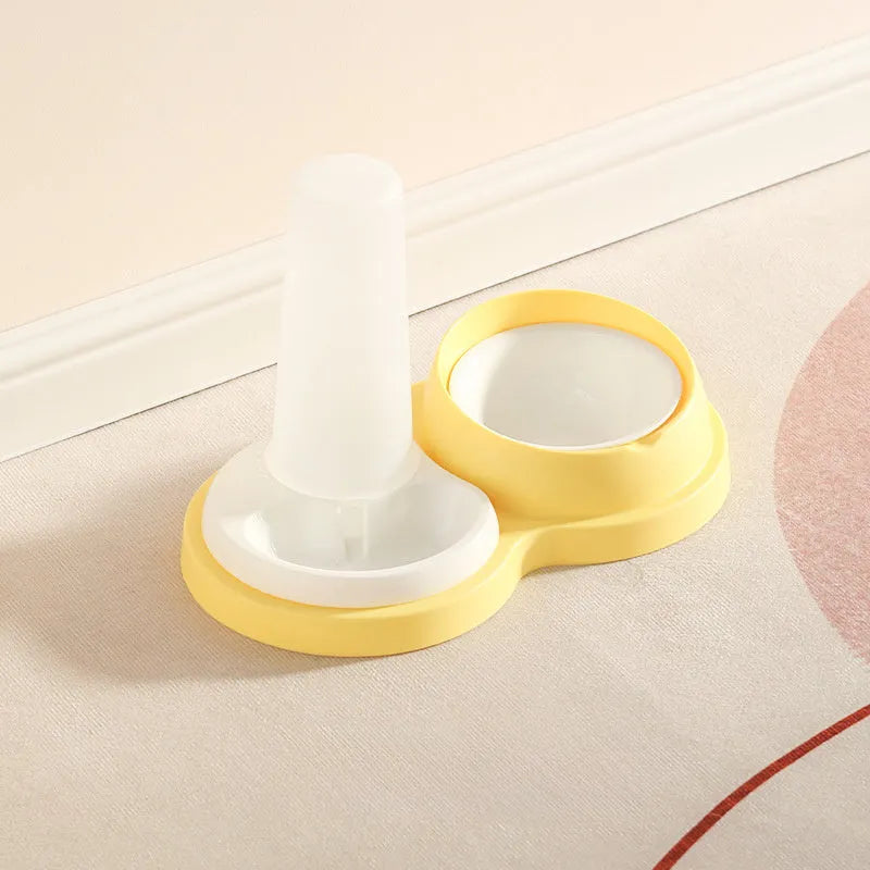 Grey and yellow dual pet food bowl with raised design for neck protection