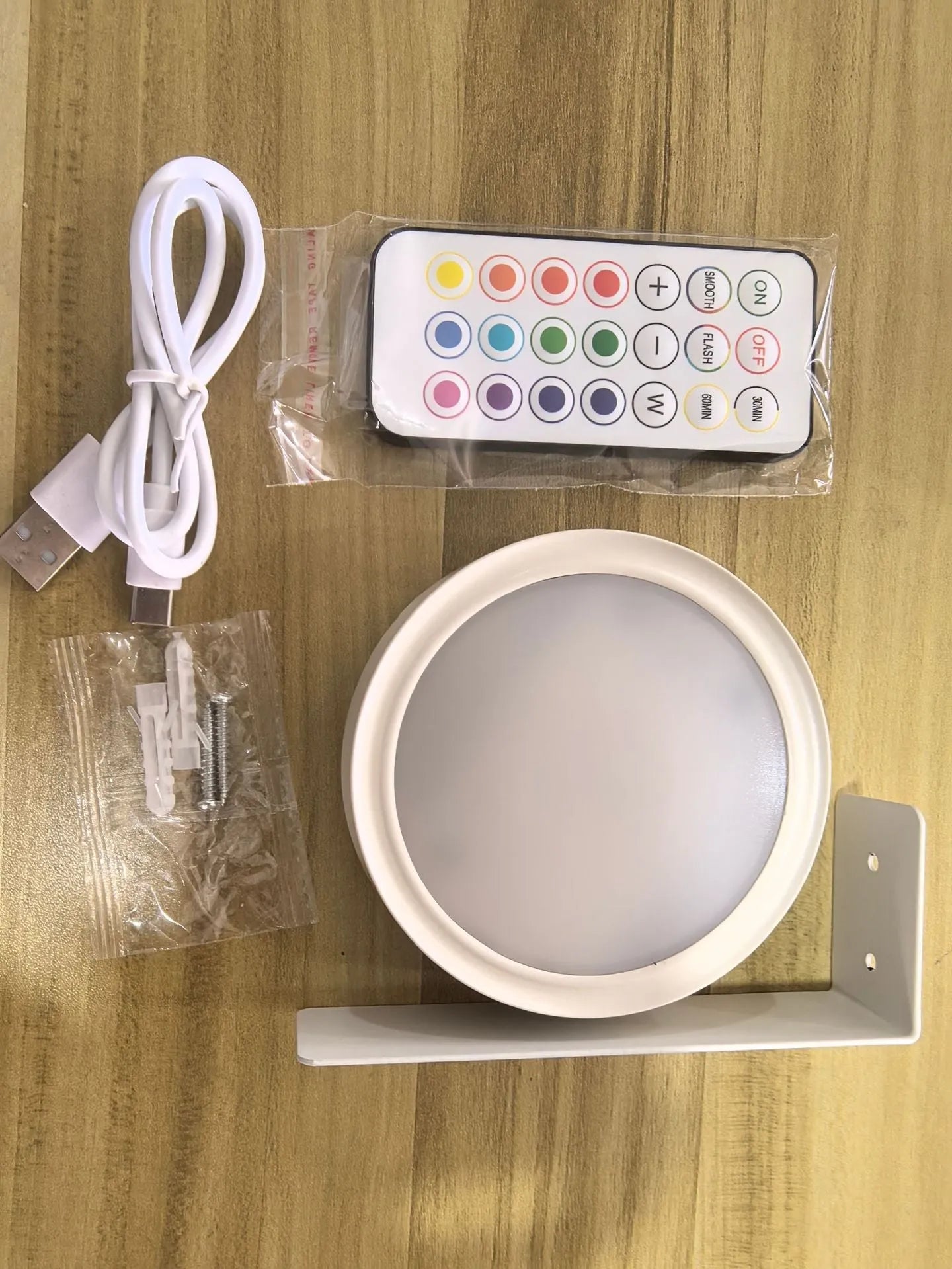 Wireless LED painting lamp with magnetic charging and remote control in black, white or gold finish