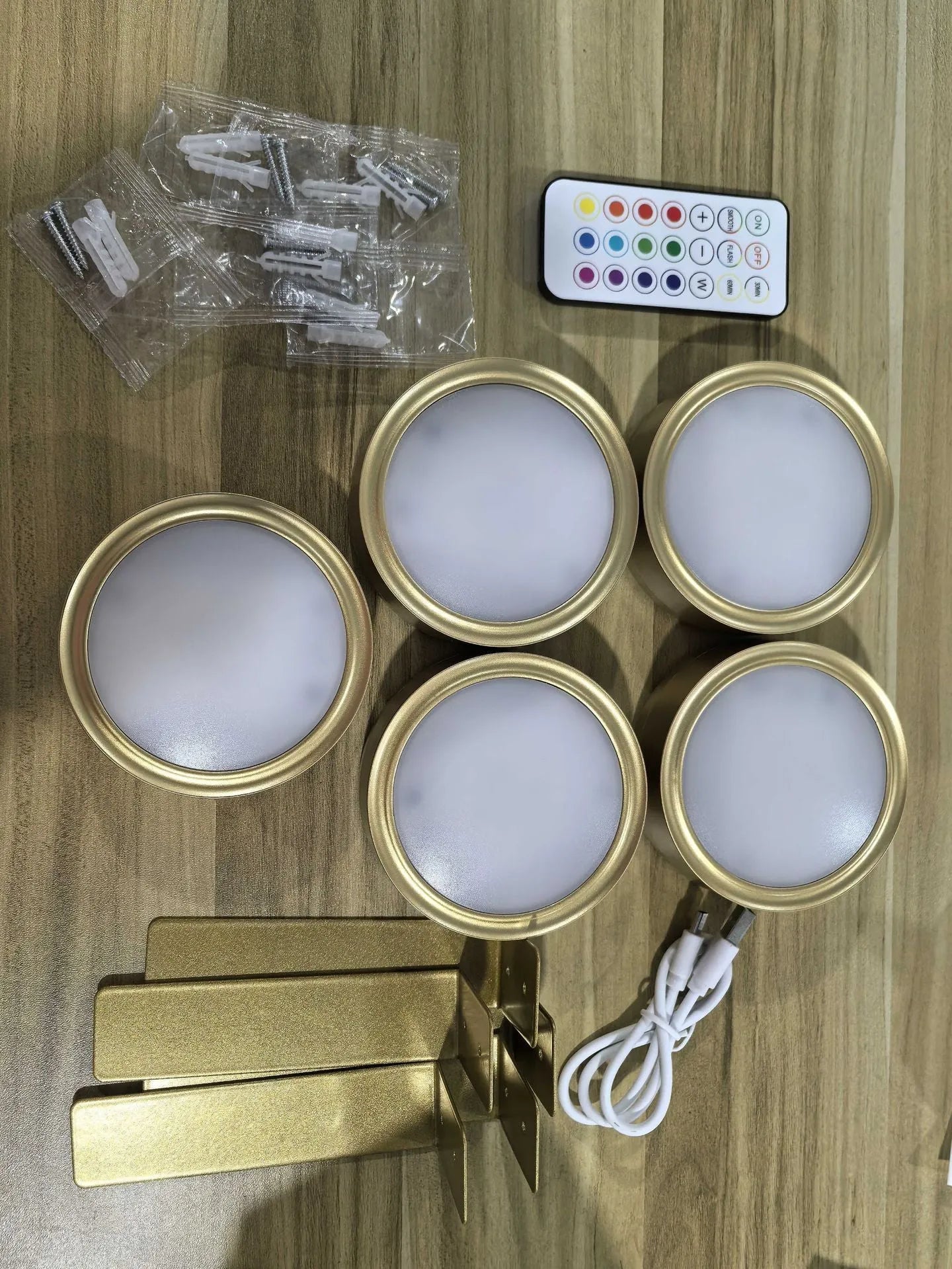 Wireless LED painting lamp with magnetic charging and remote control in black, white or gold finish