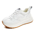 Women's beige cattlehide leather low-top casual sports shoes with cross-strap design
