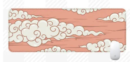 Large natural rubber desk mat with Japanese cloud pattern on a wooden desk, showing non-slip base.