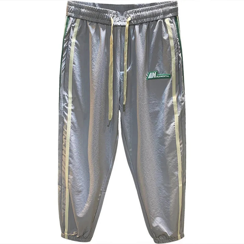 Men's solid colour cotton harem pants with elastic waistband in black or grey