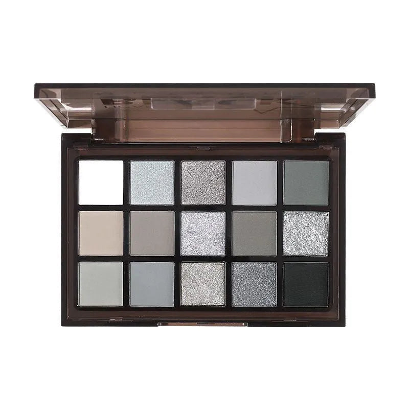 15-colour eyeshadow palette open, showing pans of shimmer, matte, grey, brown, and blue eyeshadows.
