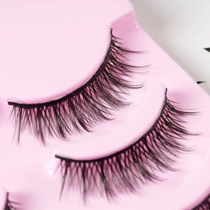 Set of five pairs of black wispy manga-style false eyelashes for anime cosplay and Korean makeup.