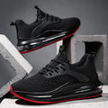 Men's low-top black mesh running sneakers with a round toe and lace-up front on a rubber sole.