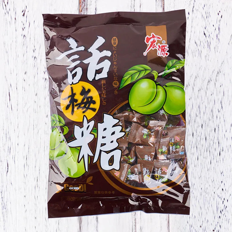 Assorted fruit flavoured hard candy bulk pack showing plum, guava, and tangerine peel varieties