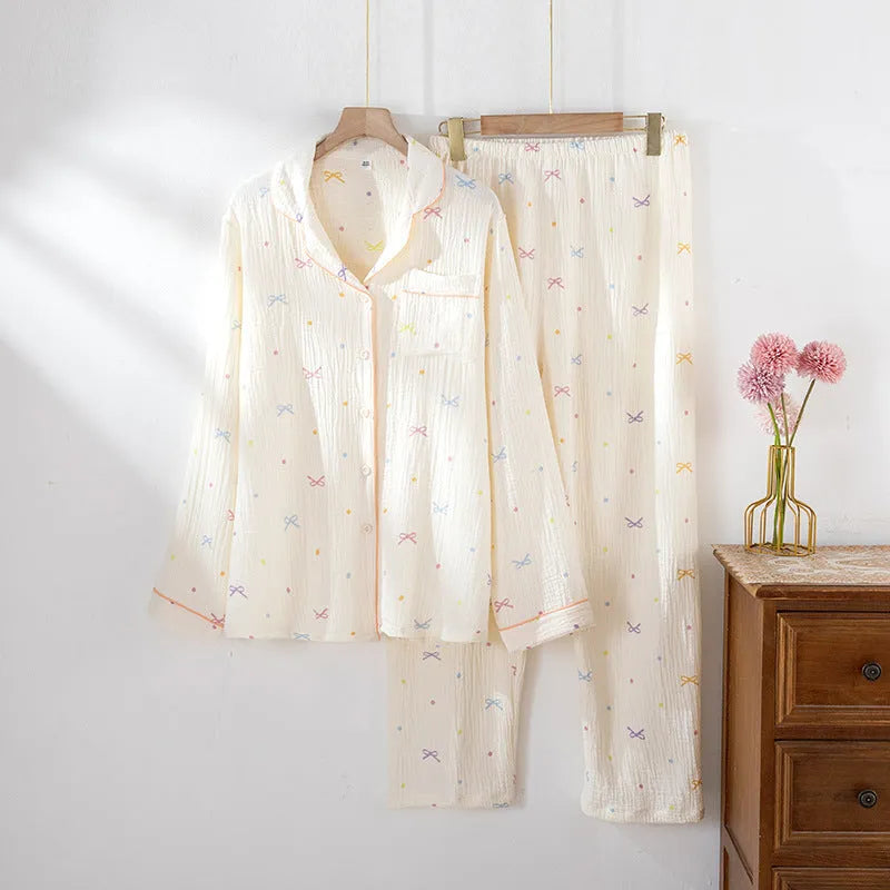 Women's cotton pajama set showing long sleeves and matching trousers in simple casual style