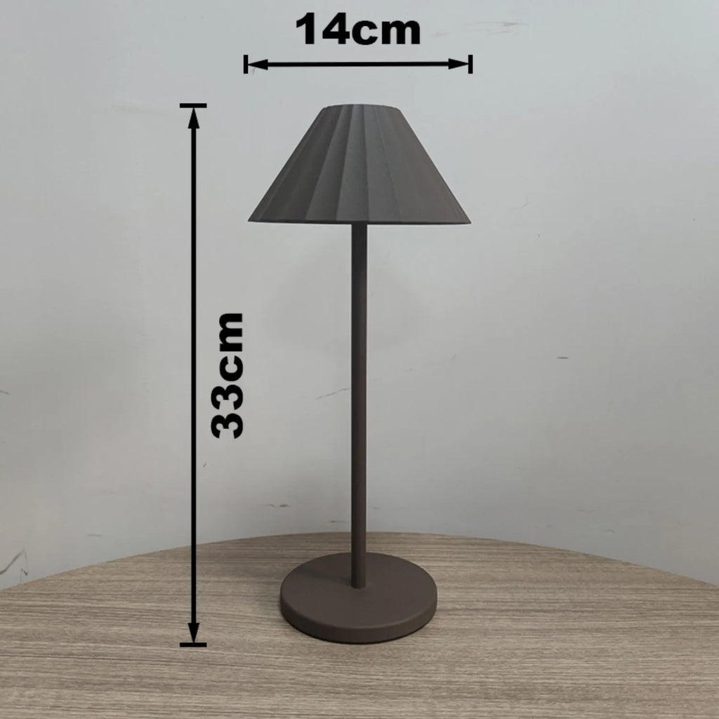 Alloy desk lamp with touch dimmer in one of four colour options: black, brown, sand, or white.