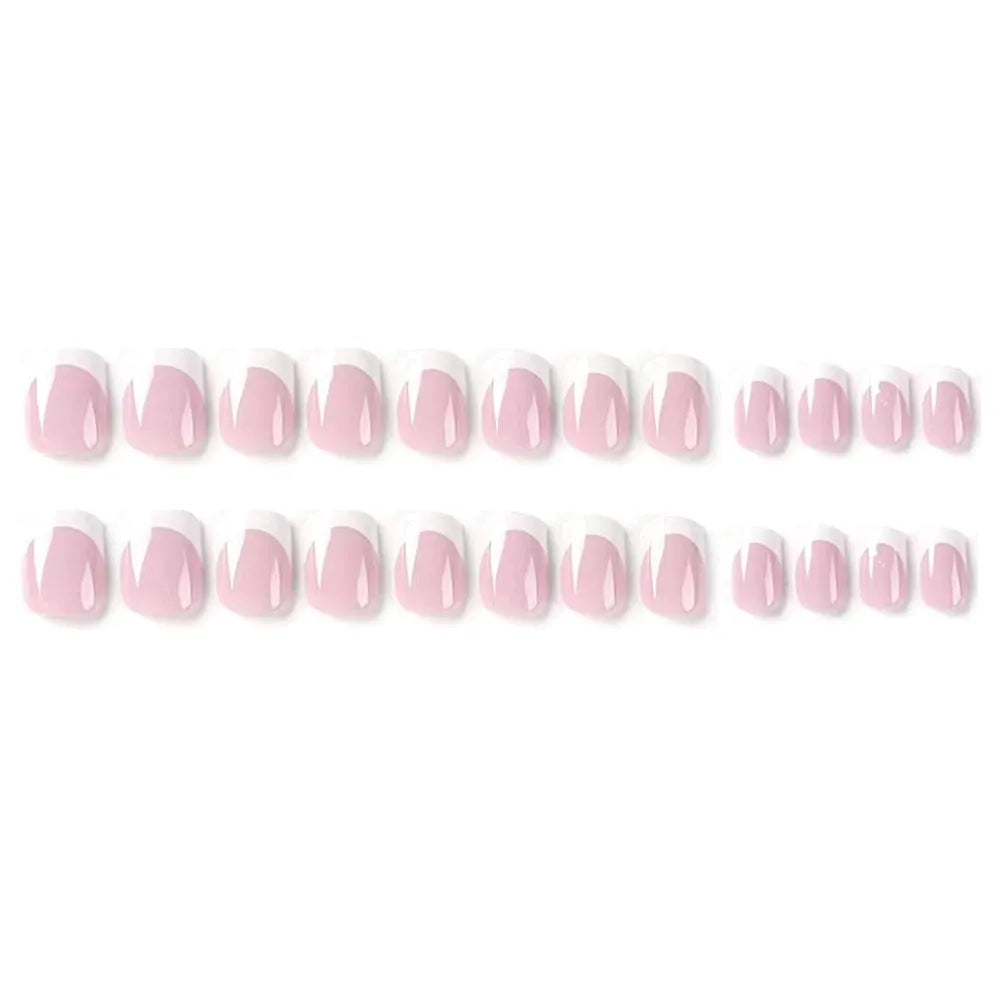 24 white false nail tips with a plaid pattern, laid out on a surface