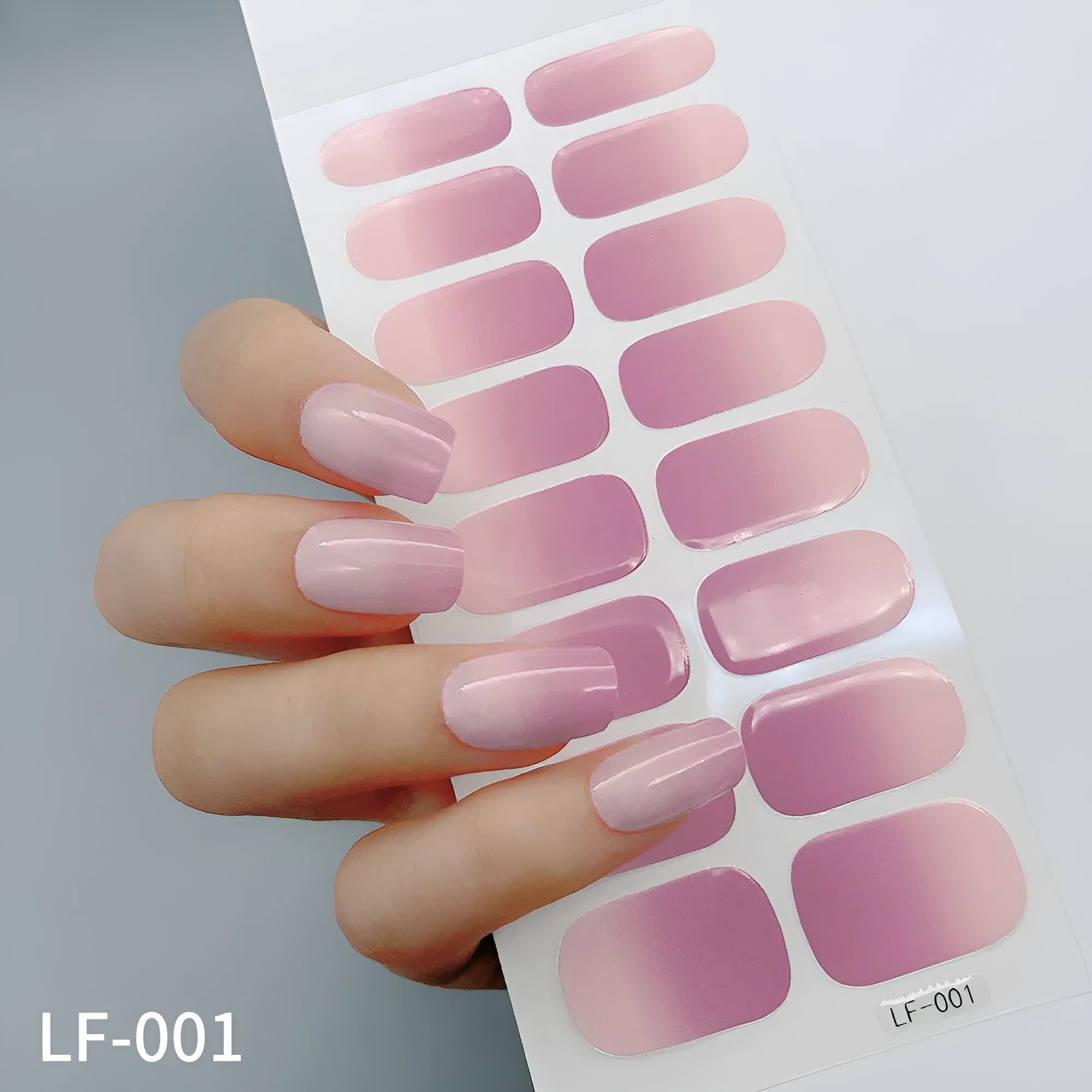 Sheet of 16 solid colour nail art sticker designs including cross, rose, and leopard print patterns.
