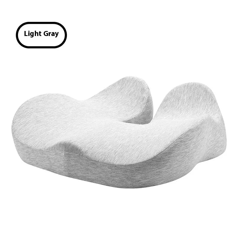 Memory foam office chair seat cushion in light grey, shown on a black office chair.