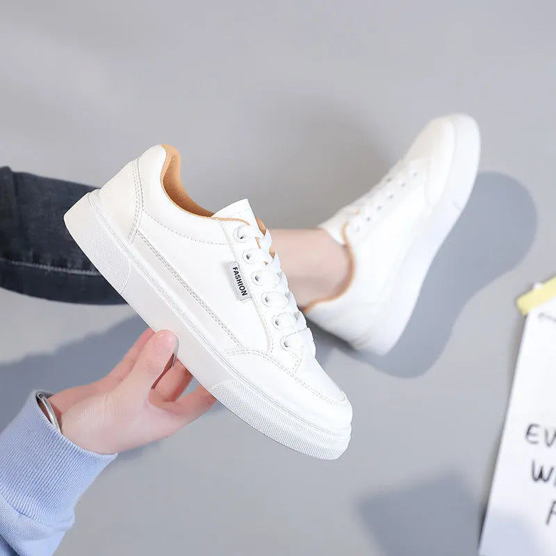 Korean style low-top sneakers in white and brown colours with artificial PU upper
